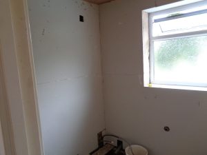 Bathroom walls boarded ready for tiling