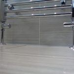 Chrome heating pipes comming out of the floor