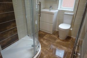 Shower Room with Modern Storage Basin sink and Toilet