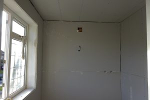 Build studded wall in ensuite bathroom and plaster board 