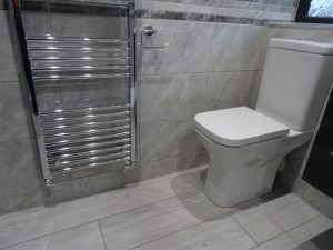 Bathroom Fitted with Wood Effect Porcelain Floor Tile