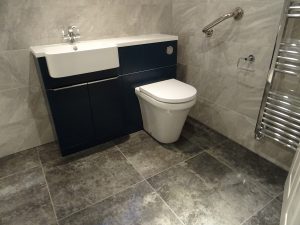 Mobility Shower Room Kenilworth with Tavistock Match Oxford Blue vanity Unit
