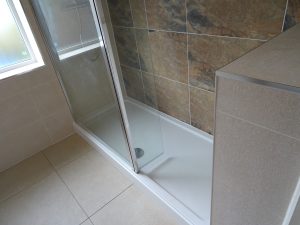 Walk in shower room Kenilworth with stone resin shower tray