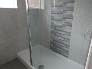 Bathroom tiled with Feature Panel shower wall