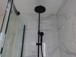 Tavistock Merit Dual Shower Matt Black fitted in bathroom in Coventry